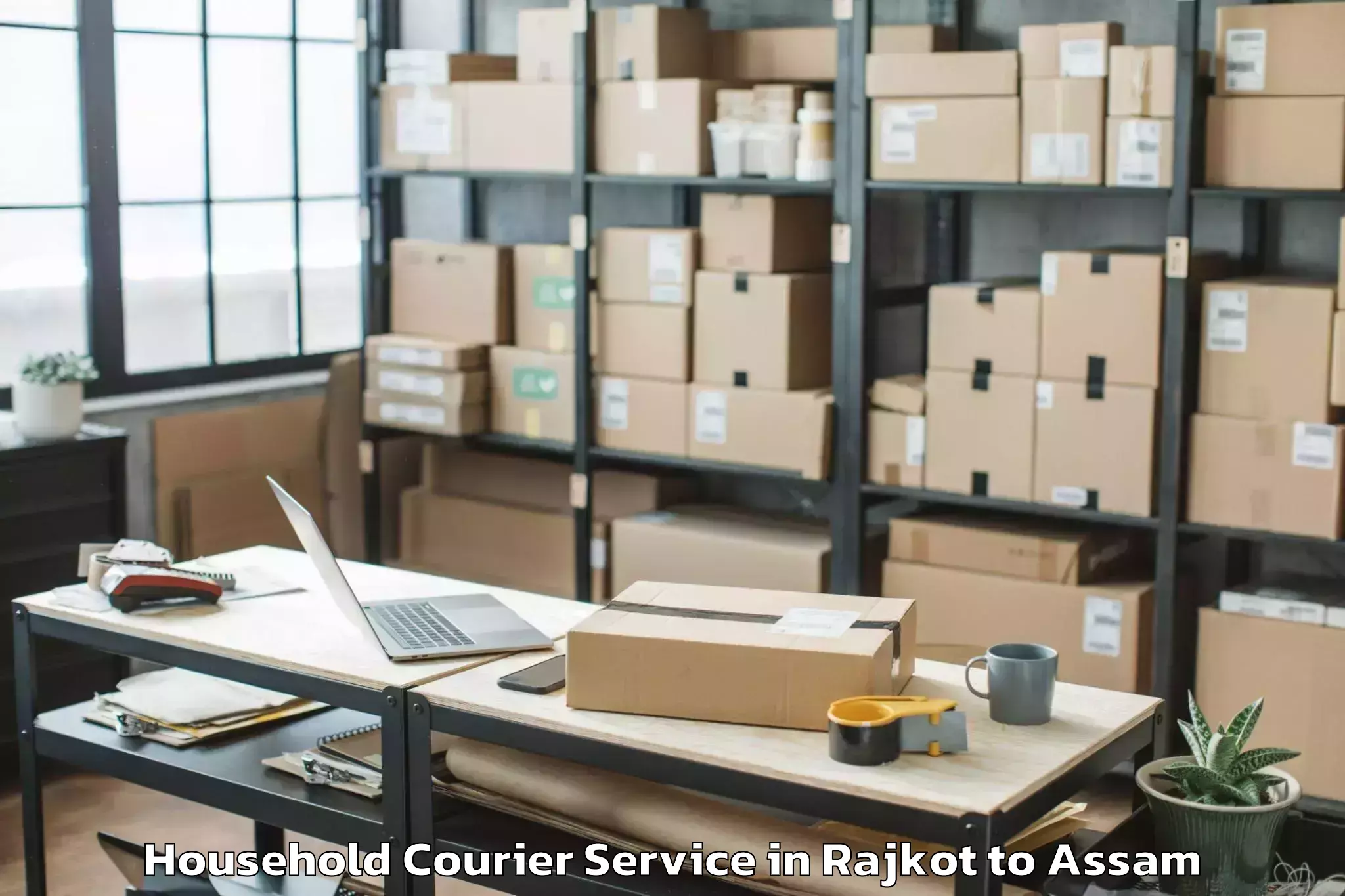 Book Rajkot to Dhuburi Household Courier Online